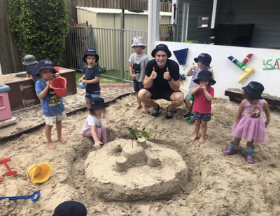 Children building sandcastles